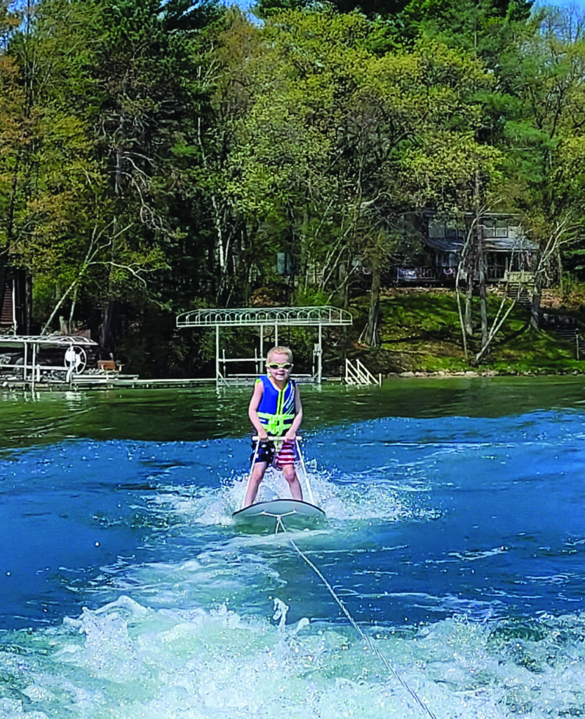 Henry Lewitzke, 4, gets in some early season skiing on Round Lake.