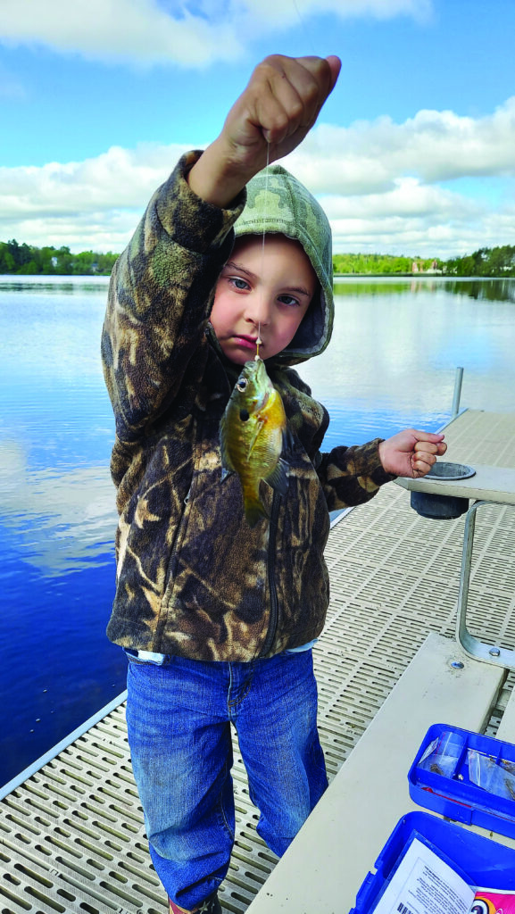 This little fish was a big deal for this younger fisherman.
