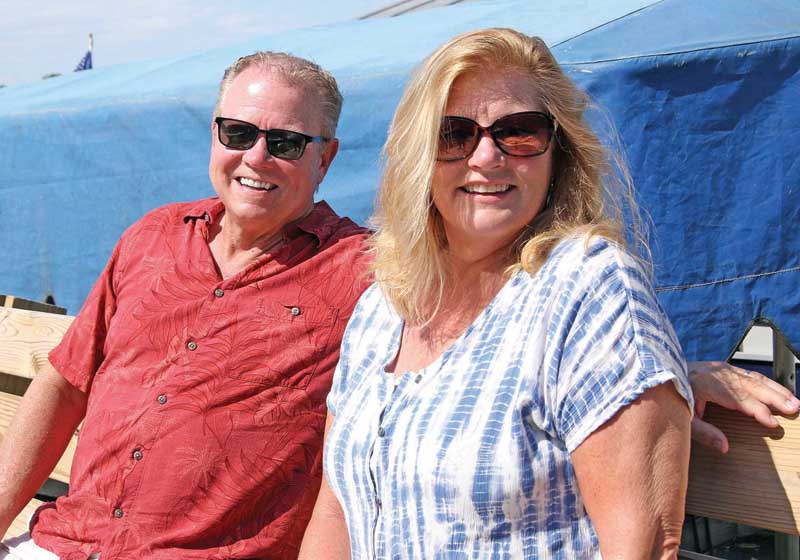 Hal and Gaye Patton were enjoying the sun on the shore of Taylor Lake.