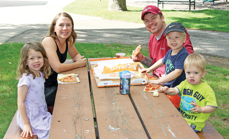 Josh and Kayla Euehs, along with their children Cooper, Jessa and Brody were having pizza in the park.
