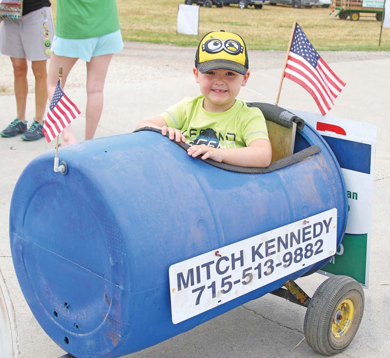 Landon Lepine, 4, was excited go go for a ride in a barrell.