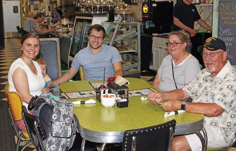 The Schultz families were enjoying lunch together in downtown Waupaca.