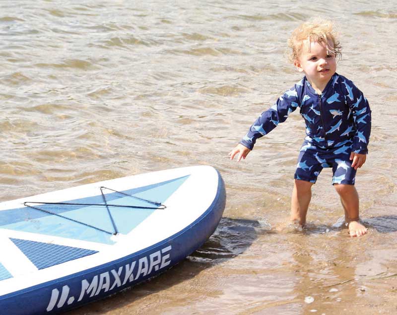Little Jack Lichtenheld, 21-months-old, wanted to try out a standup paddle board.
