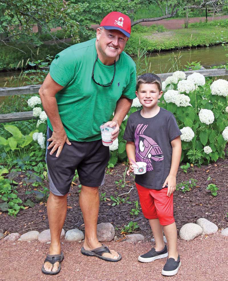 Mark Elliott and his grandson were cooling off with some ice cream.