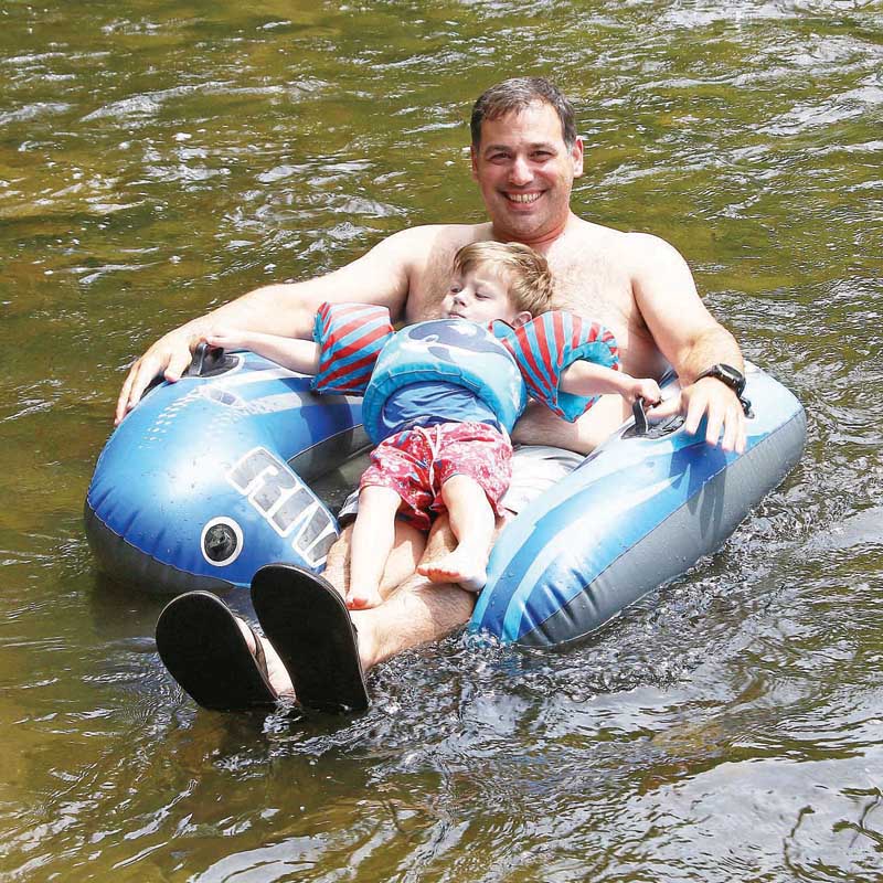 Nathan House and his son Henry were relaxing on the river.