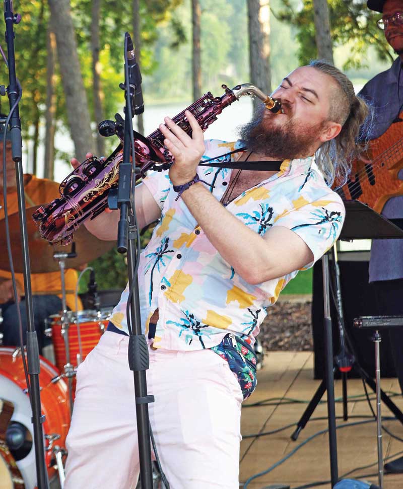 Saxy Wizard Micheal Wilmont from the Kelly Jackson Band, entertained guests with an amazing saxophone solo during the Summer Nights Concert at South Park.