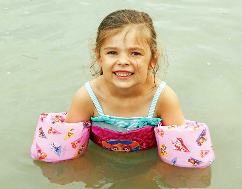 4-year-old Avayla was cooling off in the water while visiting the Waupaca area.