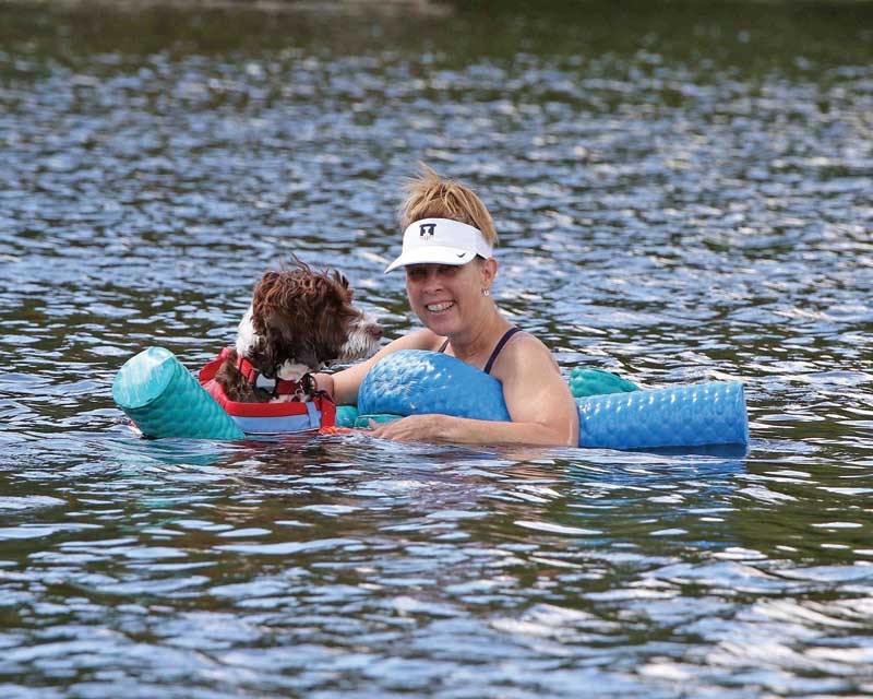 Sandy McKeough and her dog Milly were cooling off in Beasley Lake.