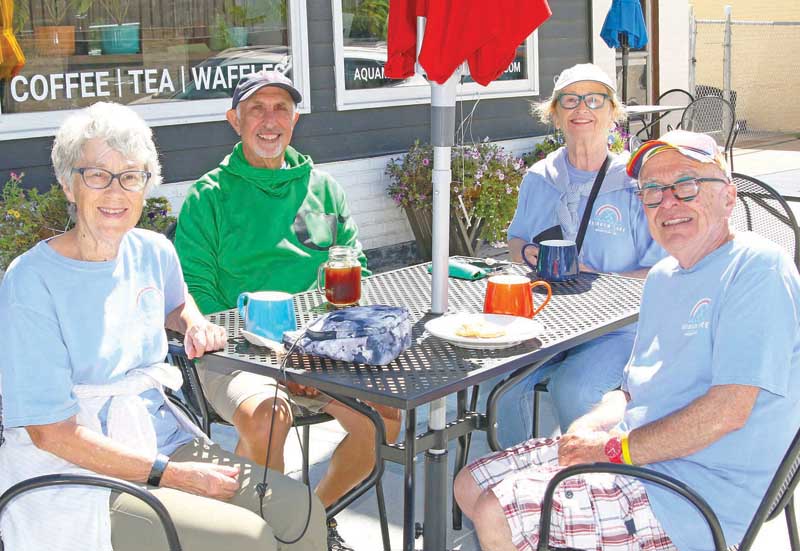 Jan Jewett, Rick Nitti, Maureen Patrick and Michael Phair were dining outdoors along Main Street in Waupaca.