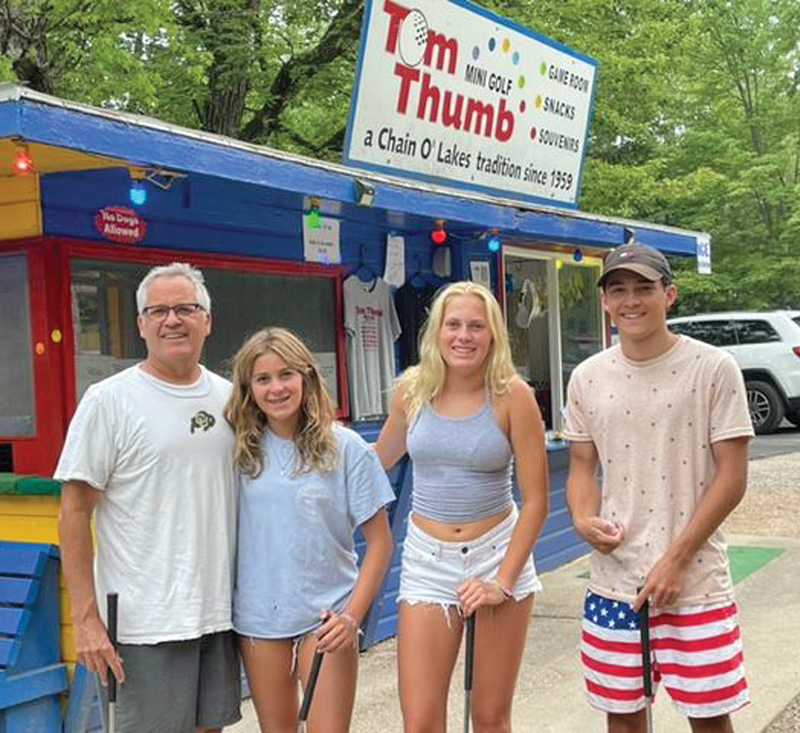 The Kelley family enjoying mini golf at Tom Thumb’s.