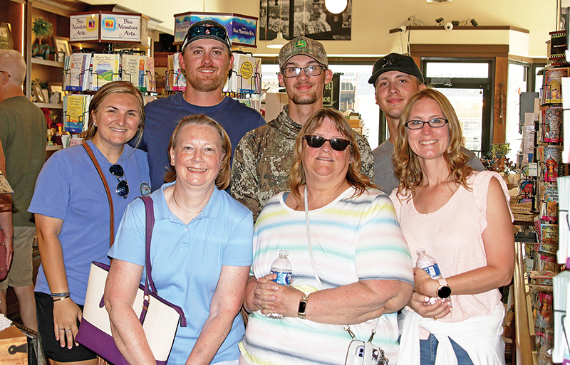 Bonnie, Alicia, Cheryl, Tyler, Morgan, Kenny and Brandon were spending the day shopping together in downtown Waupaca.