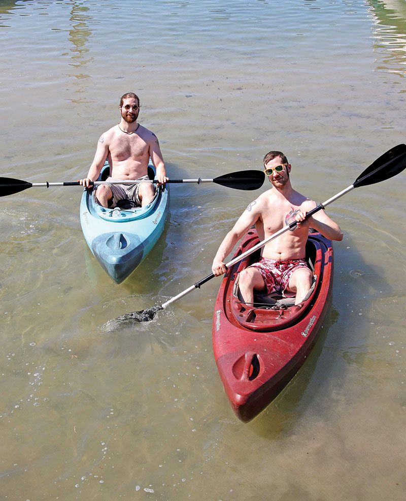 Brothers Brandon and Andrew Forseth were enjoying the water in the kayaks.