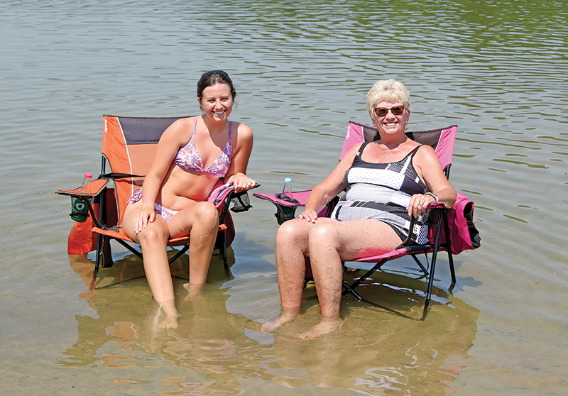 Emily Kling and her grandma Terri Murphy were cooling off in Hartman Lake.