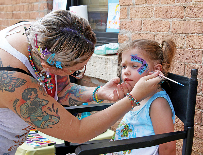 Makenna Rausch, 4, was getting her face painted during Strawberry Fest activities in Waupaca.