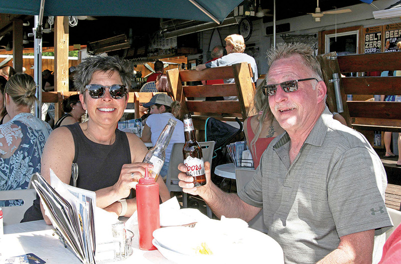 Tom and Jill Kramer give a toast to summer!