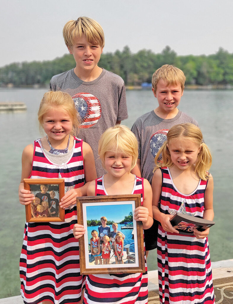 Tyler, Layne, Ophelia, Persephone, Aniston getting ready for the 4th on McCrossen Lake with their red, white and blue.