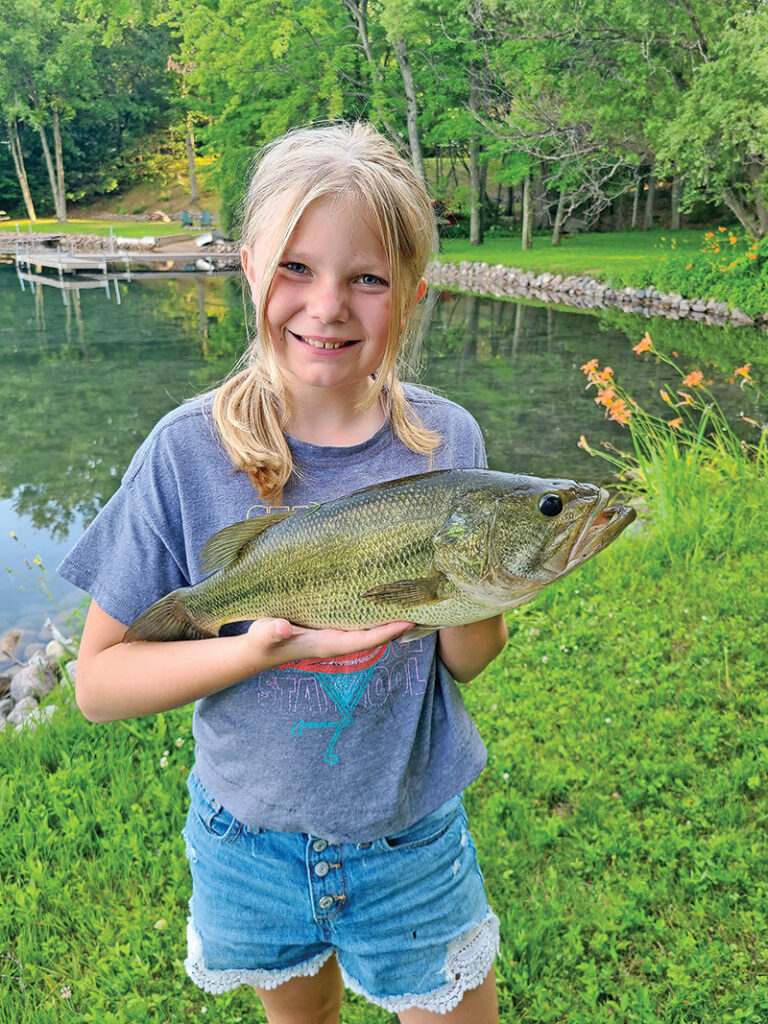 Brooklynn Forseth-Swenson caught this Largemouth Bass, July 18, on Spencer Lake. She estimated it at 31 inches. Hey, even little girls can make up fish stories.