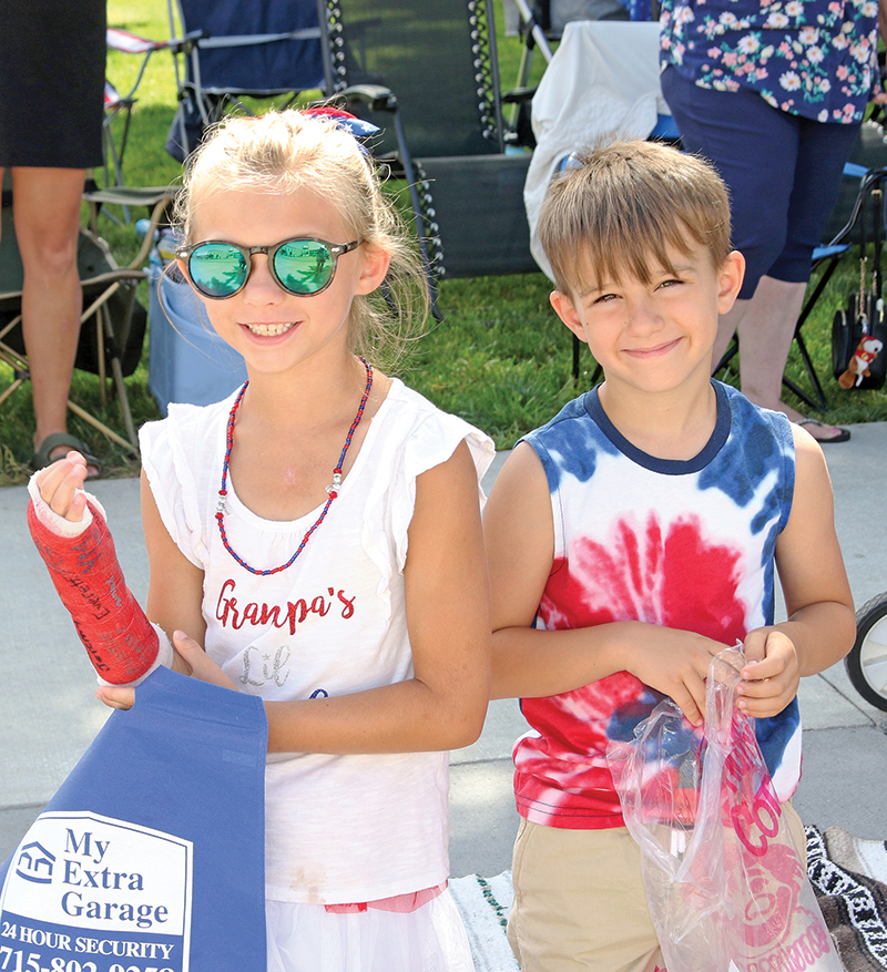 Celia Fox and Beckham Funderwhite were ready to collect candy during the 4th of July parade.