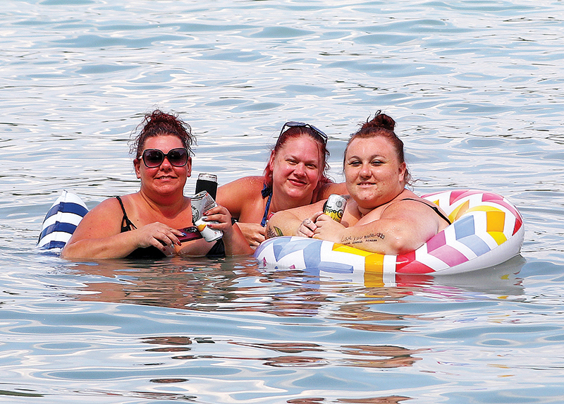 Jenny, Kayla and Tiffany were cooling off in the water.