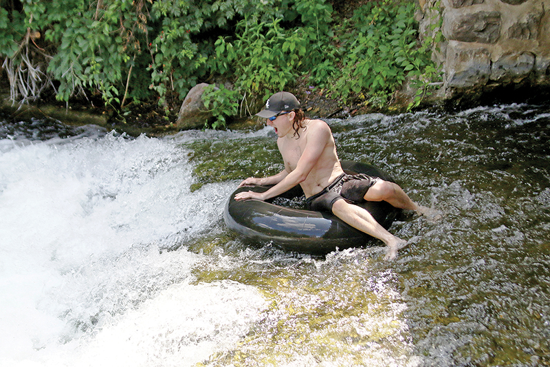 Karl Haynes was screaming as he comes into some white water while on an inner tube.