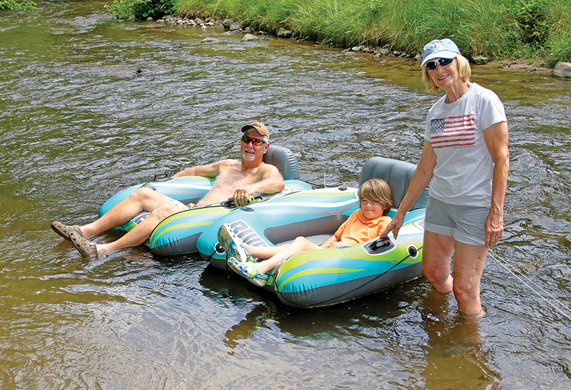 Ron Bennett, Henry Felten and Jacquie Phalen were cooling off in the Crystal River.