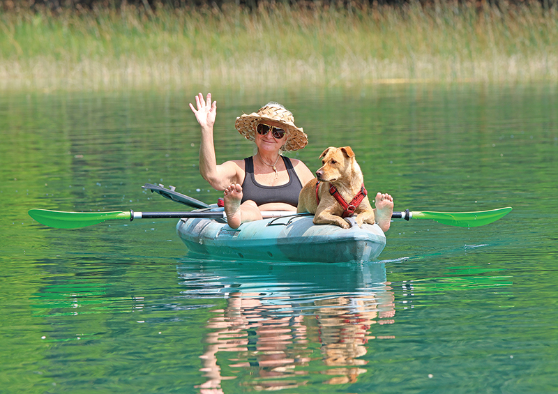 Hazel the Great Amierican Kayak Dog and her owner Pat Fellner on Marl Lake.